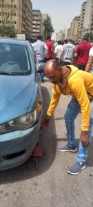 محافظة الجيزة تزيل تعديات علي الطريق العام وبروز لمحال تجارية وأكشاك بشوارع ربيع الجيزي والمحطة والأهرام وميدان الجيزة 63 - جريدة المساء