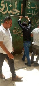 محافظة الجيزة تزيل تعديات علي الطريق العام وبروز لمحال تجارية وأكشاك بشوارع ربيع الجيزي والمحطة والأهرام وميدان الجيزة 57 - جريدة المساء