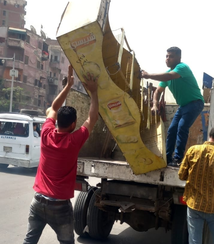 محافظة الجيزة تزيل تعديات علي الطريق العام وبروز لمحال تجارية وأكشاك بشوارع ربيع الجيزي والمحطة والأهرام وميدان الجيزة 19 - جريدة المساء