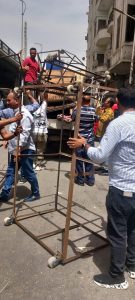 محافظة الجيزة تزيل تعديات علي الطريق العام وبروز لمحال تجارية وأكشاك بشوارع ربيع الجيزي والمحطة والأهرام وميدان الجيزة 25 - جريدة المساء