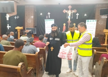 توزيع لحوم مجانًا على 500 أسرة بكنائس منفلوط 25 - جريدة المساء