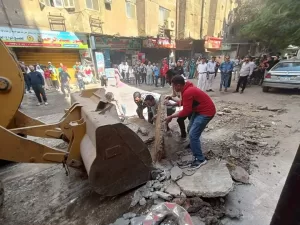 بالصور- أكبر حملة إشغالات بالجيزة | إزالة تعديات المحال التجارية والباعة الجائلين من الطريق العام بفيصل 35 - جريدة المساء