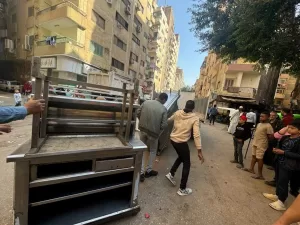 بالصور- أكبر حملة إشغالات بالجيزة | إزالة تعديات المحال التجارية والباعة الجائلين من الطريق العام بفيصل 33 - جريدة المساء