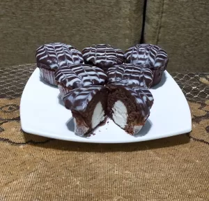 كب كيك بحشو جوز الهند ومغطى بالشوكولاتة بطريقة احترافية 20 - جريدة المساء