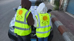 أمانة المرأة بحزب الشعب الجمهوري بقنا توزع 500 وجبة ساخنة على الصائمين بمواقف السيارات 35 - جريدة المساء