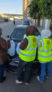 أمانة المرأة بحزب الشعب الجمهوري بقنا توزع 500 وجبة ساخنة على الصائمين بمواقف السيارات 39 - جريدة المساء