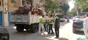 بالصور.. إزالة إشغالات لباعة جائلين ومقاهي مخالفة خلال حملة مكبرة بالدقي 27 - جريدة المساء