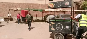 بالصور.. إزالة إشغالات لباعة جائلين ومقاهي مخالفة خلال حملة مكبرة بالدقي 31 - جريدة المساء