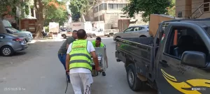 بالصور.. إزالة إشغالات لباعة جائلين ومقاهي مخالفة خلال حملة مكبرة بالدقي 39 - جريدة المساء