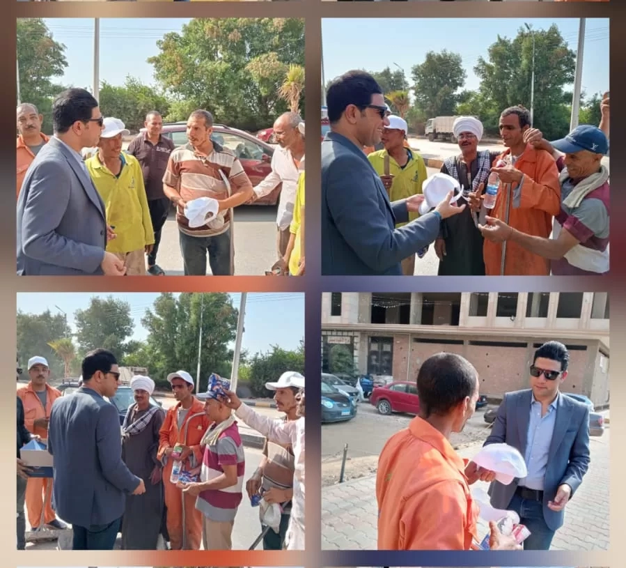 نائب محافظ سوهاج يوزع مواد غذائية وزجاجات مياه وأغطية رأس على عمال النظافة 17 - جريدة المساء