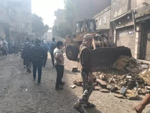 للقضاء علي مشكلة الطفوحات.. نائب محافظ الجيزة يتابع ميدانيا مشروع تجديد شبكات الصرف الصحي بأبو النمرس 31 - جريدة المساء