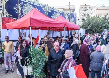 سيدات الاسكندريه يتحدين الامطار ويشاركن في الانتخابات 24 - جريدة المساء