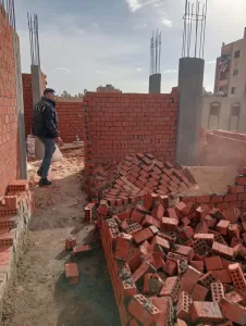 بالصور.. إزالة 11 حالة تعد بالبناء المخالف ب4 مناطق بمدينة أوسيم 71 - جريدة المساء