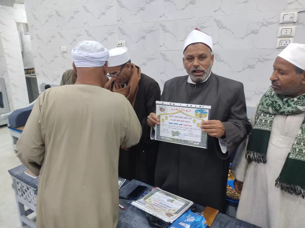 تكريم 135 من حفظة القرآن الكريم فى احتفالية كبرى بقرية الحرزات بنقادة 57 - جريدة المساء تكريم 135 من حفظة القرآن الكريم فى احتفالية كبرى بقرية الحرزات بنقادة 56 - جريدة المساء